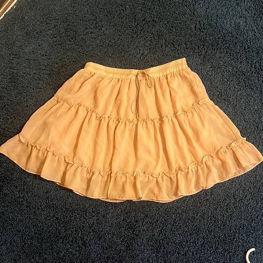 Blush pink skirt with little white polka dots